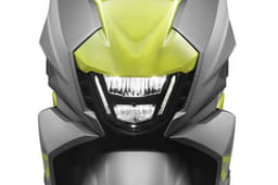 The apron-mounted headlight is a modern-looking LED unit.